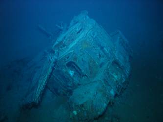 Bridge deck head resting against Director Control Tower on seabed